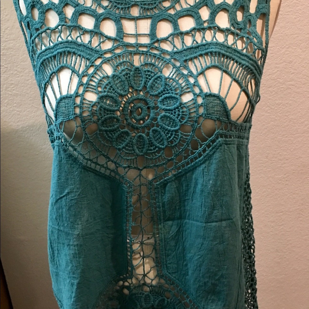 Knit / cotton top with beautiful details.